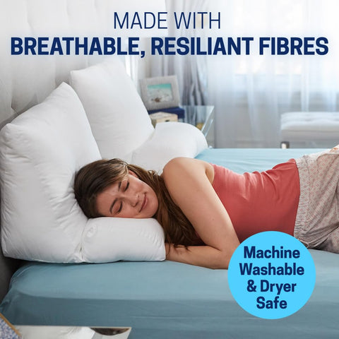 Contour Flip Pillow on bed in a bedroom setting conveying cozy lounging