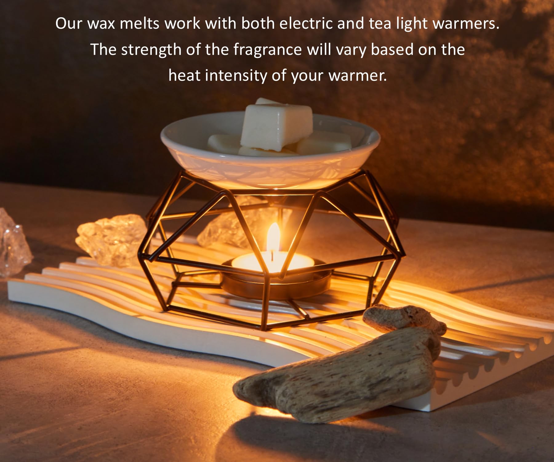 Coo Candles cube melting in electric warmer releasing warm autumn fragrance