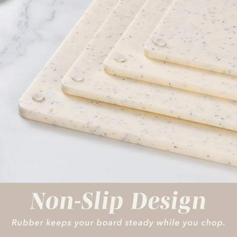 COOK WITH COLOR stacked boards displaying all four sizes for versatile prep