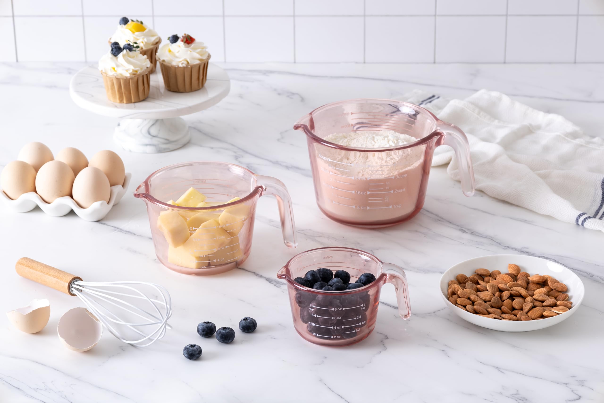 COOK WITH COLOR handle and pour spout detail for stable grip and drip-free pouring