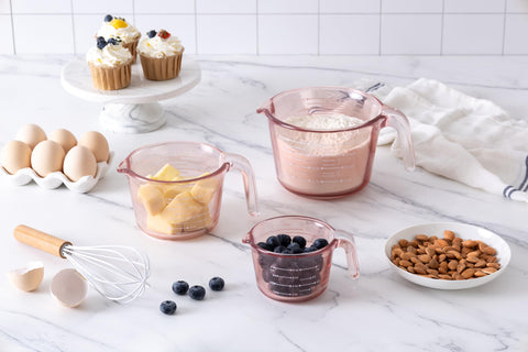 COOK WITH COLOR handle and pour spout detail for stable grip and drip-free pouring
