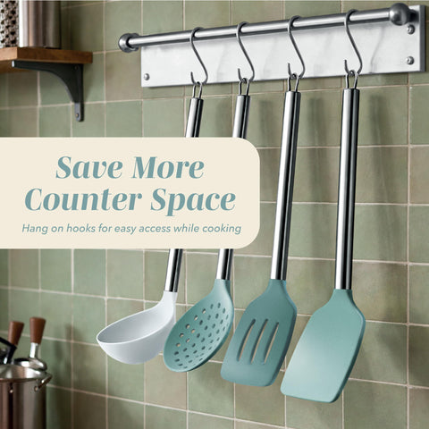 COOK WITH COLOR utensils hanging on rail for quick access and neat storage