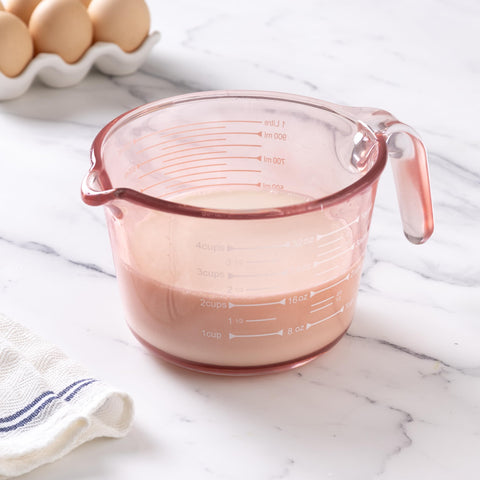 COOK WITH COLOR nested measuring cups stored compactly to save kitchen space
