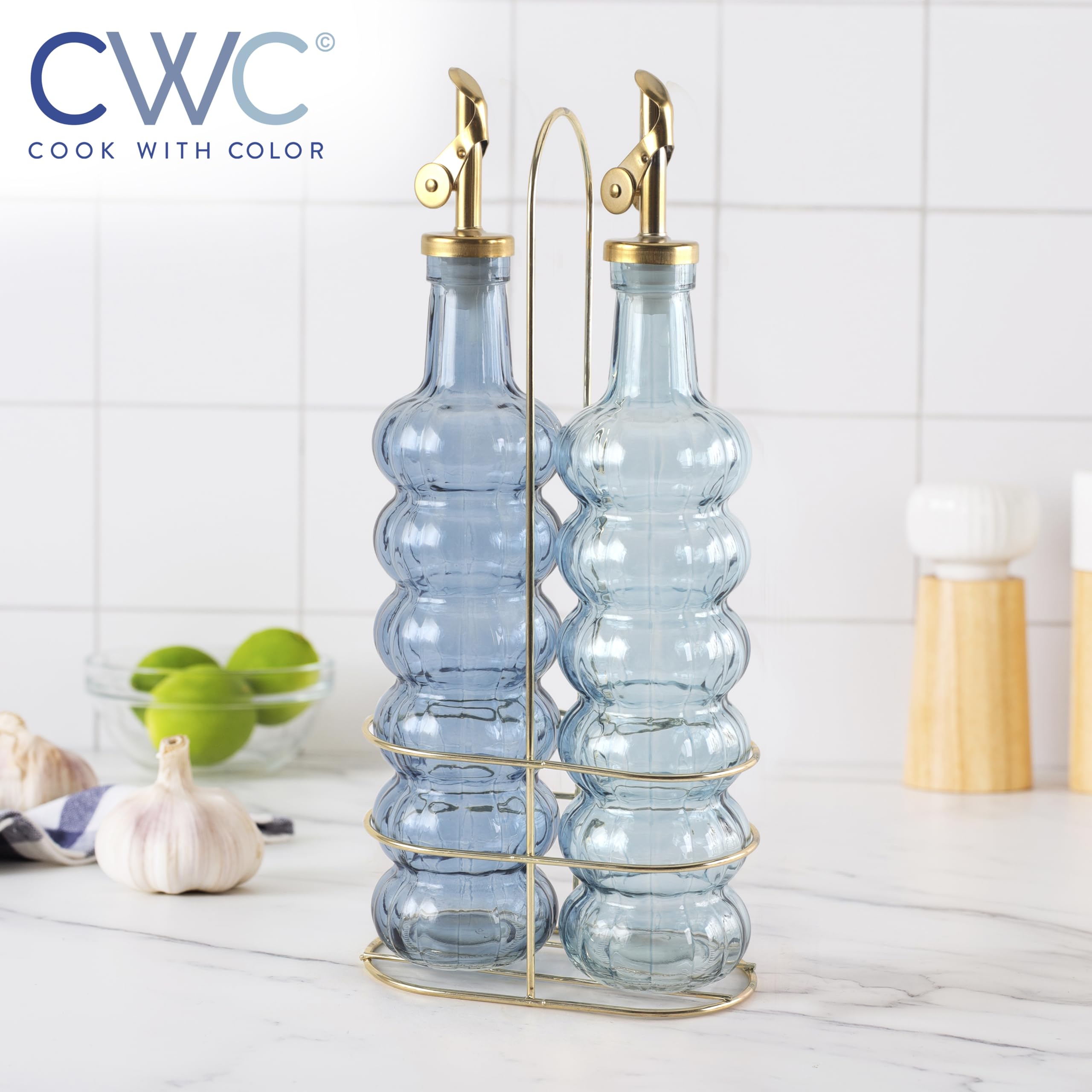 COOK WITH COLOR hand holding bottle for scale showing comfortable 17oz capacity