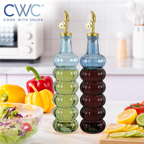 COOK WITH COLOR sturdy gold wire rack holding both dispensers neatly on countertop