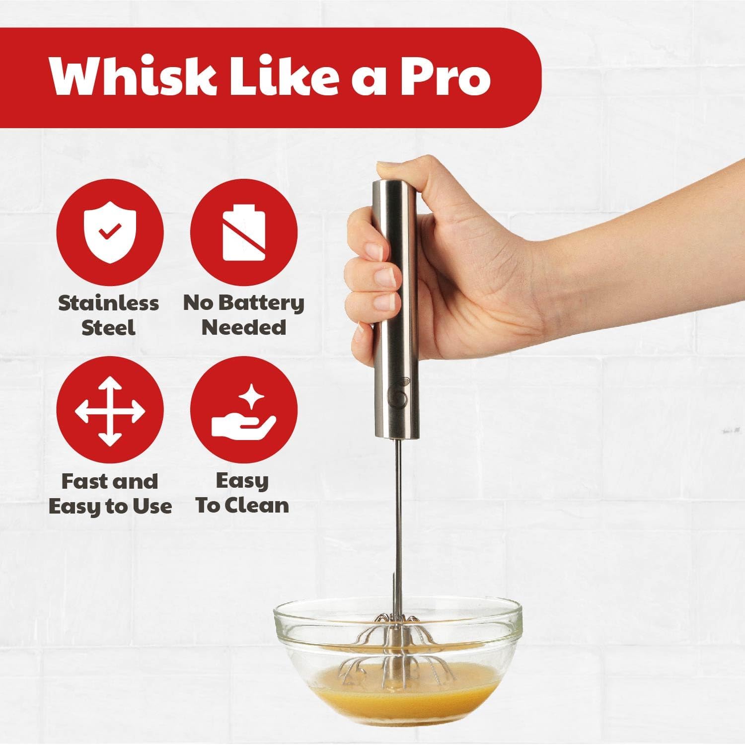 Cooks Innovations whisk frothing milk in cup to create creamy foam for coffee at home