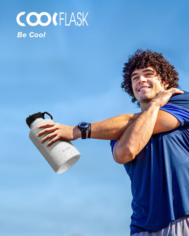 Coolflask half-gallon beside standard bottle to show true 64 oz scale