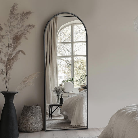Coomily mirror close-up of arched top highlighting clean edge and refined aesthetic