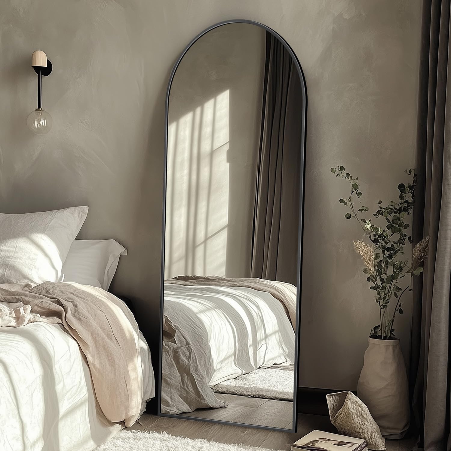 Coomily mirror side profile leaning against wall demonstrates slim footprint and stability