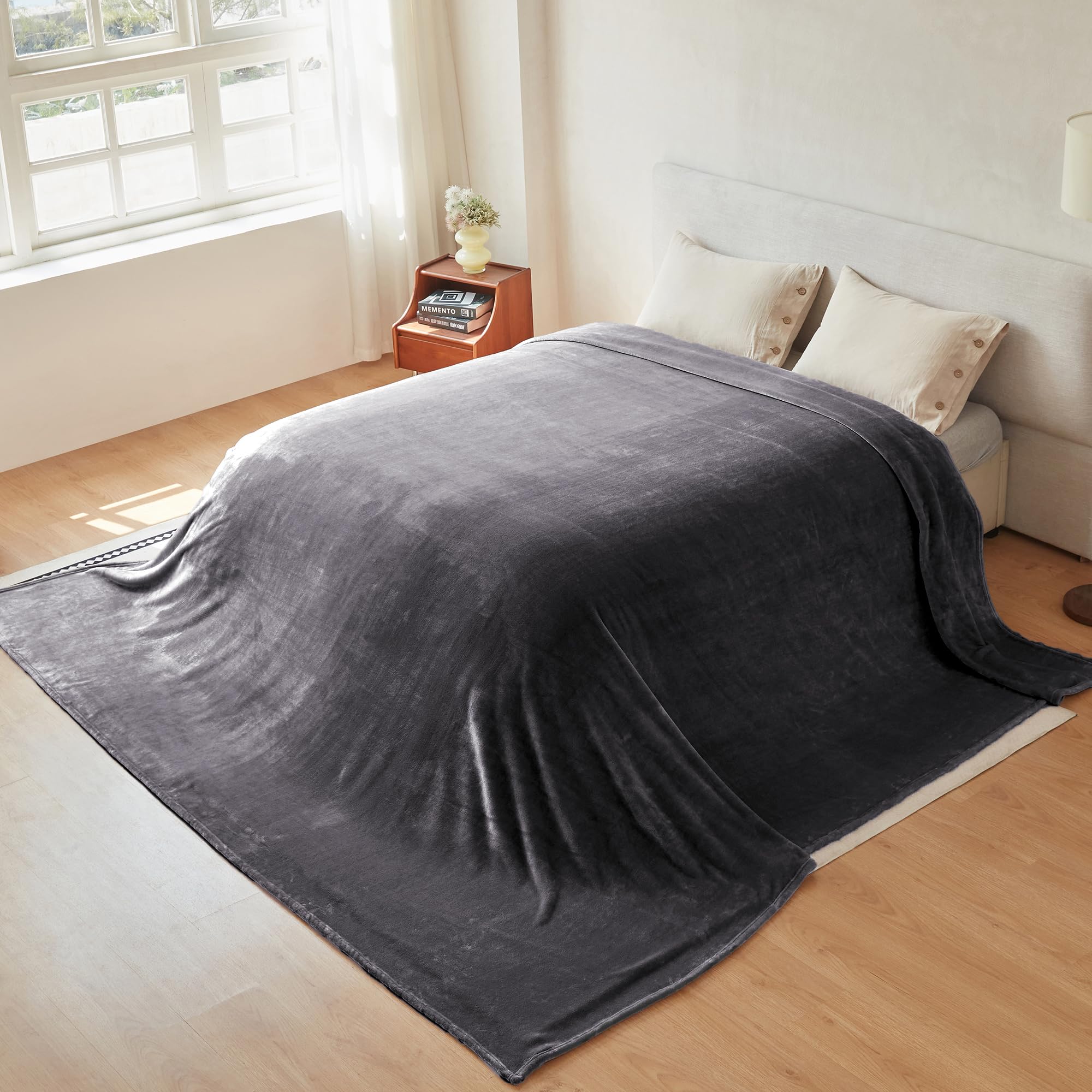 COOVA blanket on couch in living room offering comfort and style