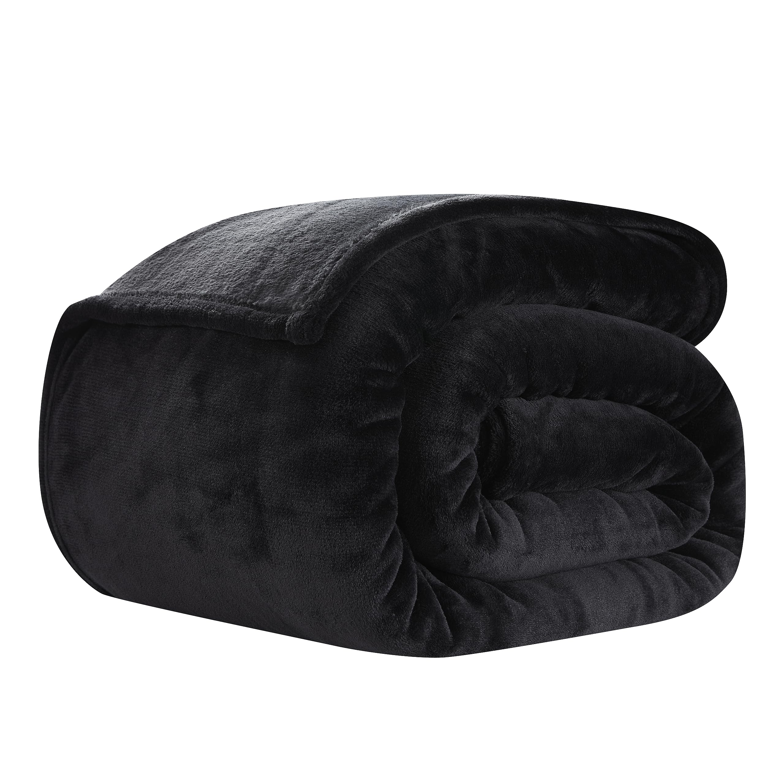 COOVA folded blanket beside pillows showing scale and portability