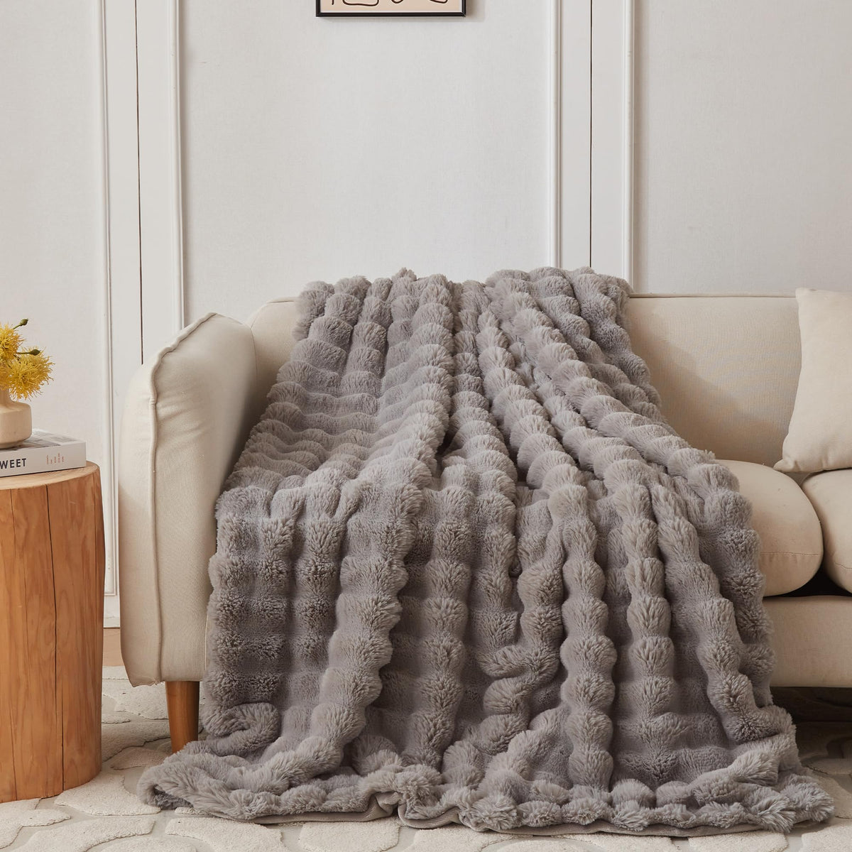 COOVA blanket front view showing grey bubble pattern and elegant finish