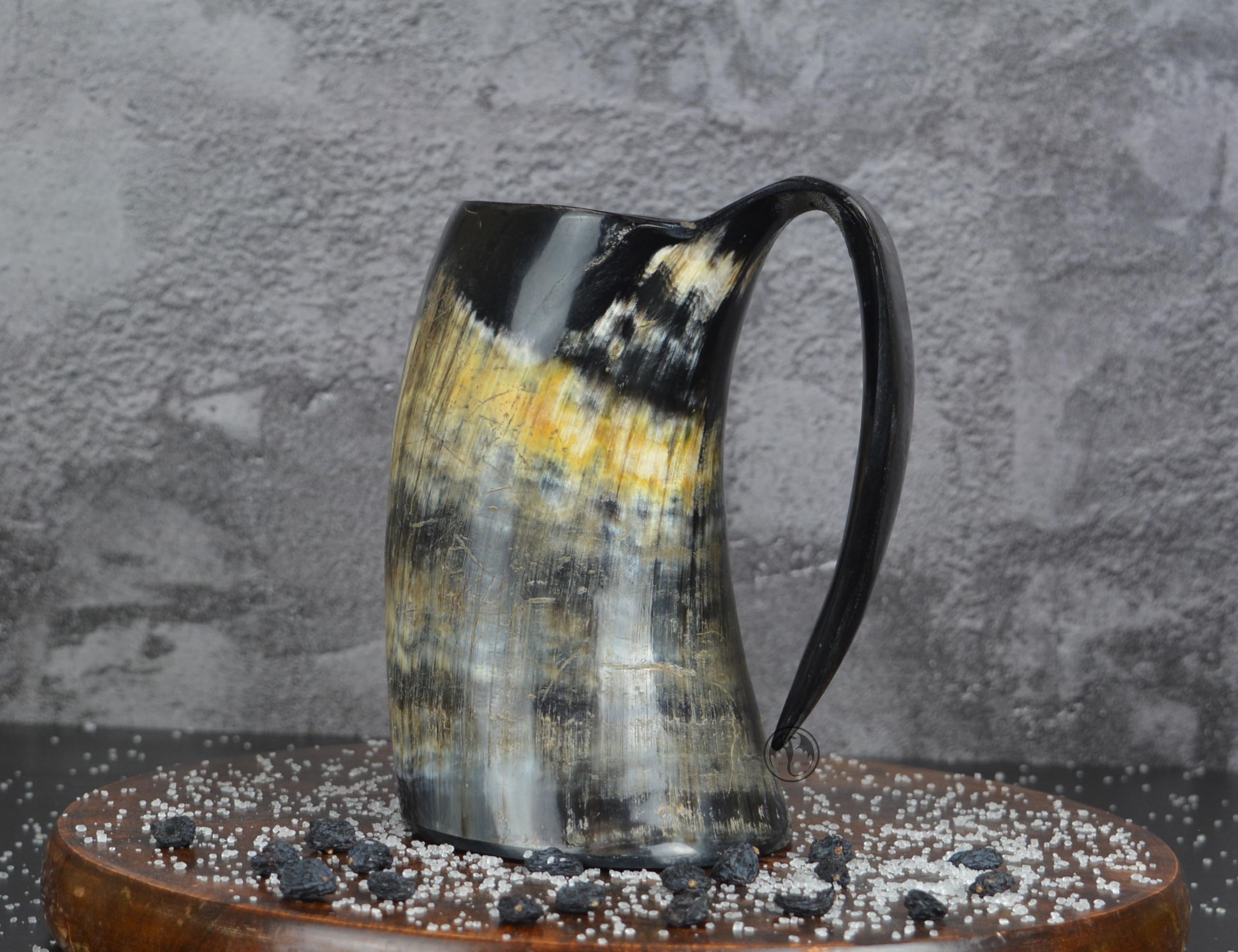 COPPERVEDA OLDEMPEROR pouring beer into horn demonstrating festive use