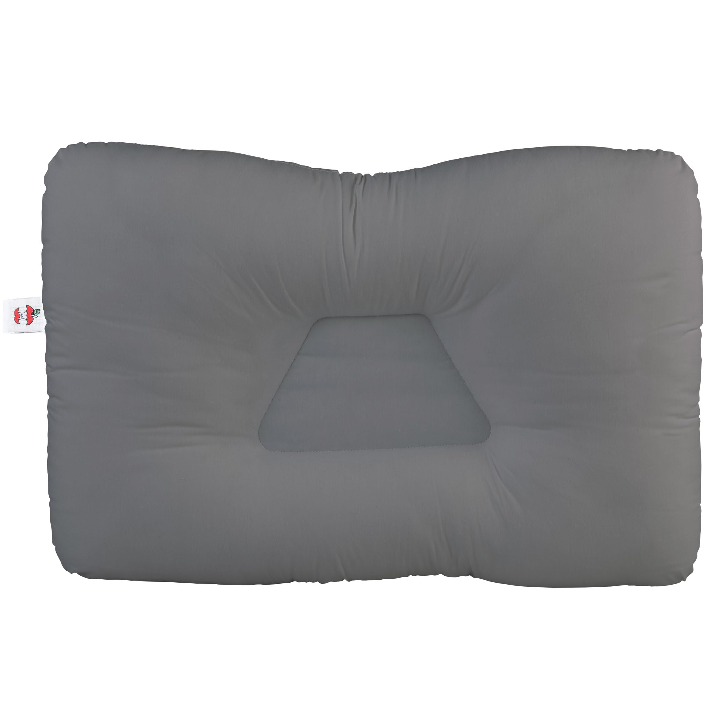 Core Products pillow styled on a bed in a bedroom scene showing real-world use