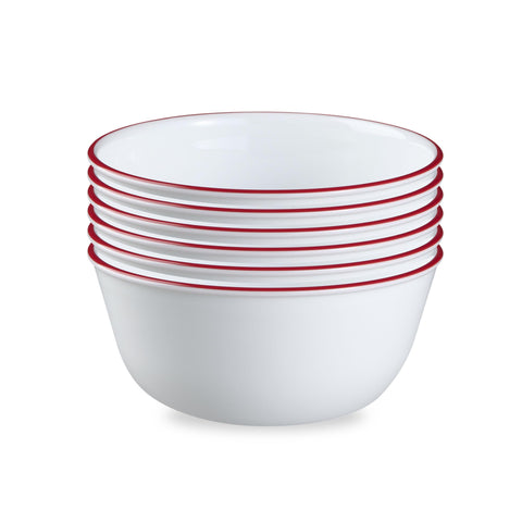 Corelle front view showing red band and clear walls, elegant table presentation