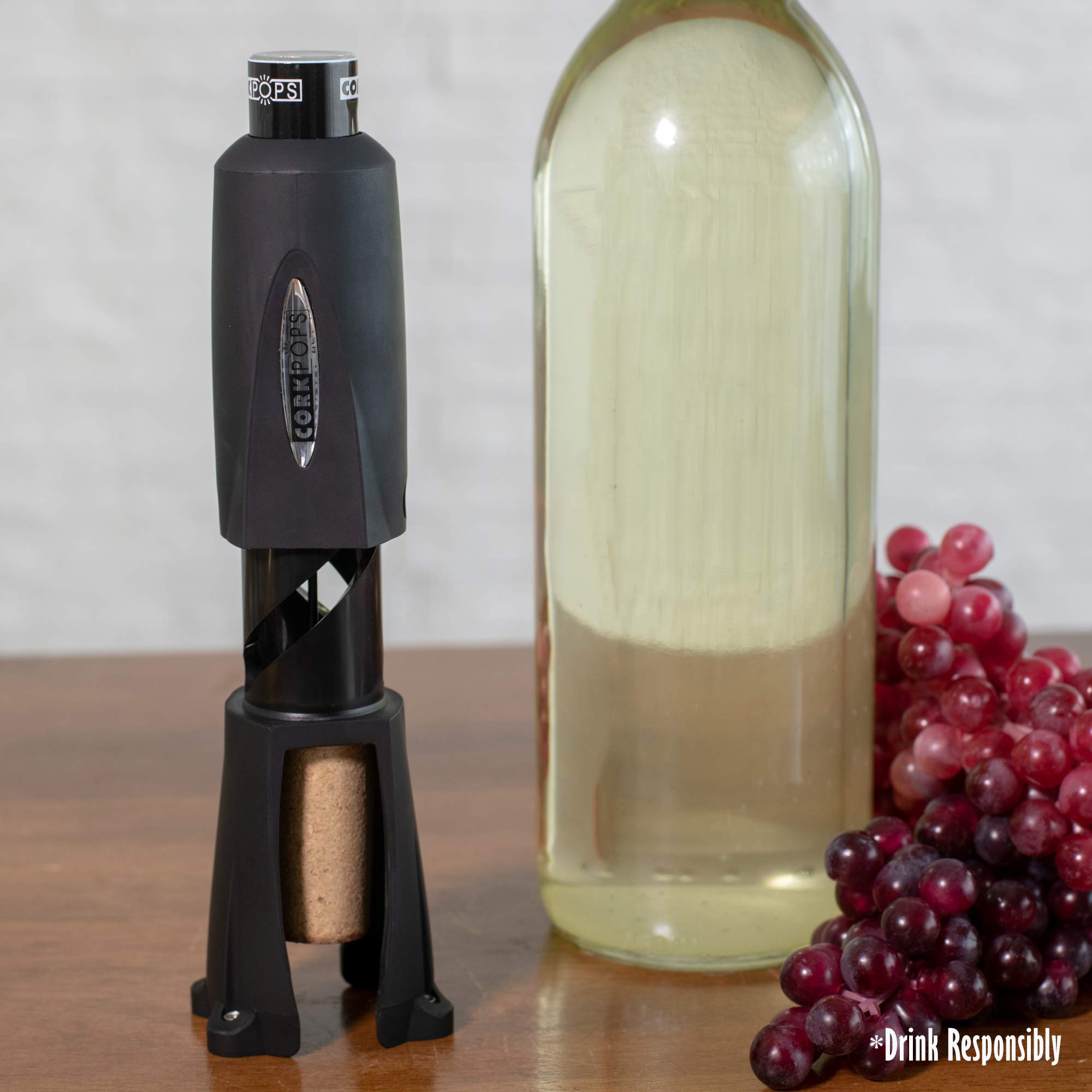 Cork Pops base with built-in four-blade foil cutter, clean seal removal benefit