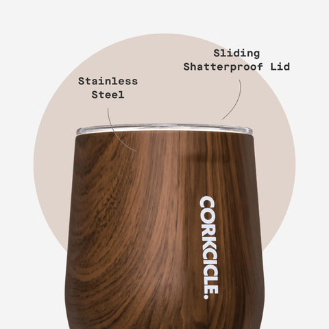 Corkcicle held in hand illustrating ergonomic flat sides for comfortable grip