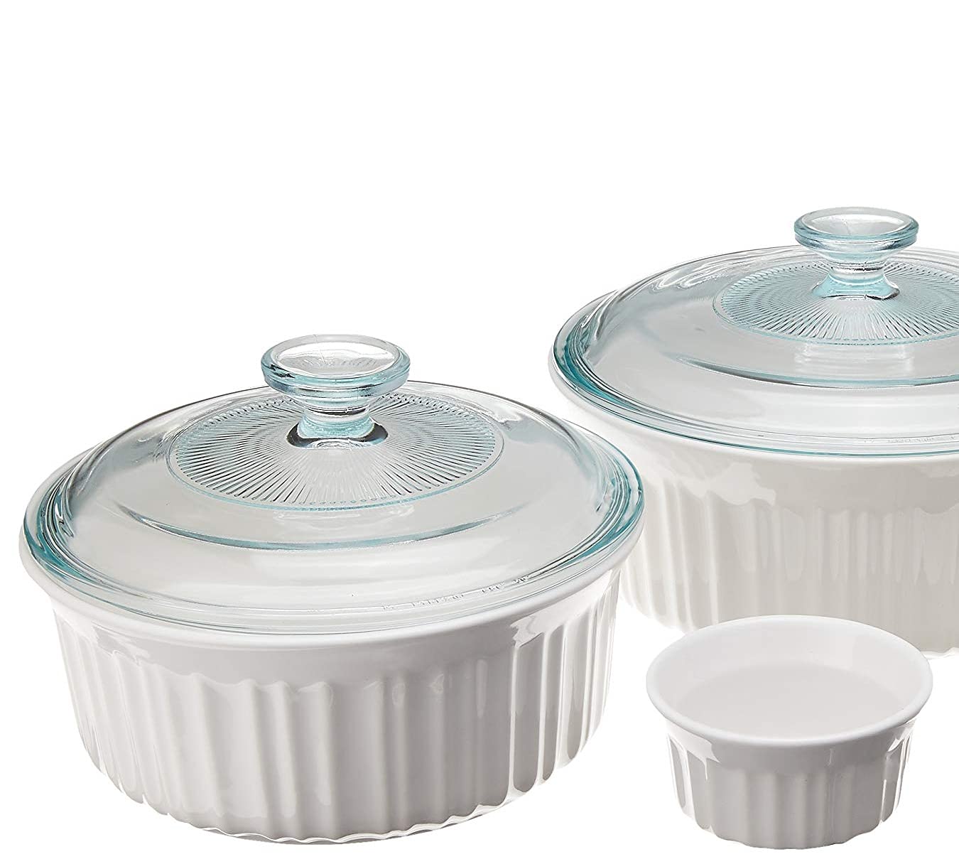 CorningWare stacked dishes with glass and plastic lids highlighting space-saving storage benefit