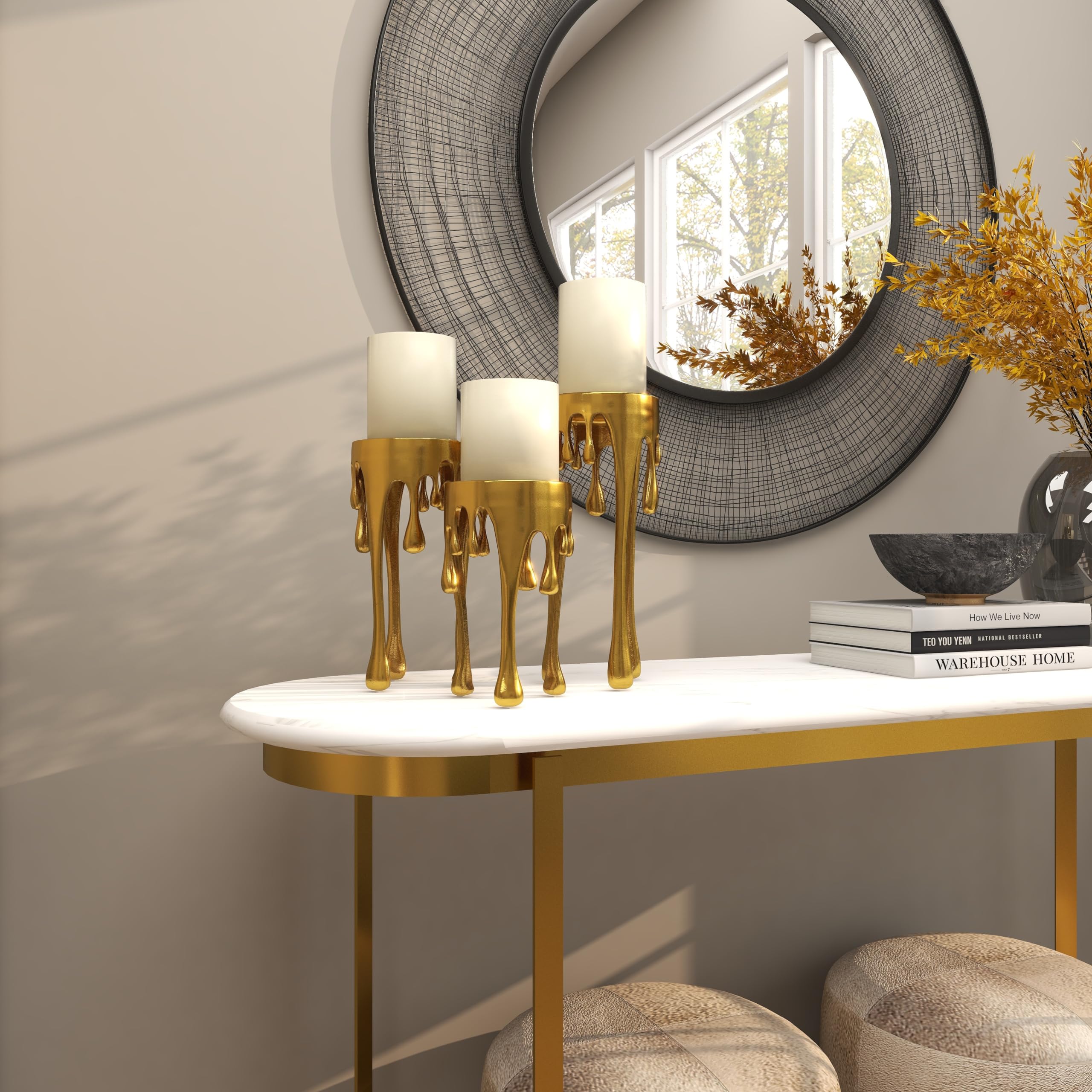 CosmoLiving trio on dining table demonstrating layered heights and centerpiece use