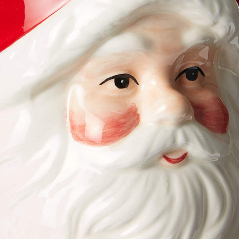 Cosmos Gifts Santa head mug in use with hot cocoa creating cozy holiday atmosphere