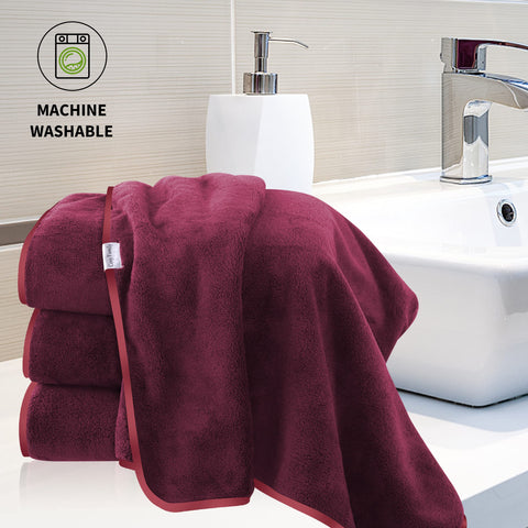 Cosy Family towel wrapped on person after shower showing fast-drying convenience