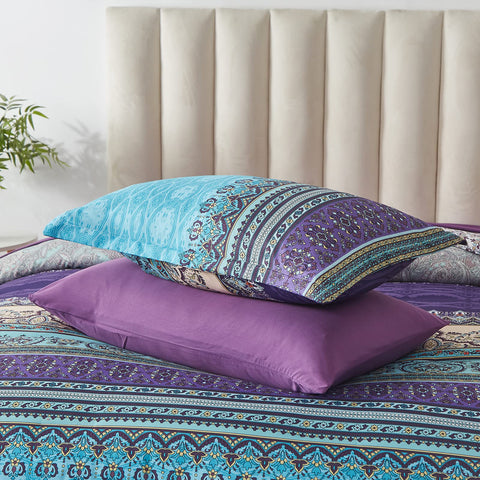 Cottolester comforter on queen bed in room demonstrating boho style impact