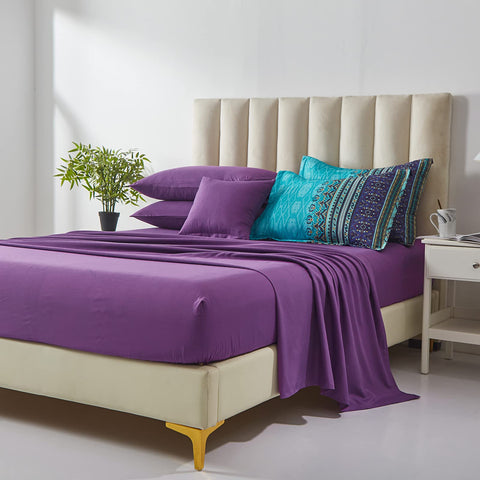 Cottolester comforter beside ruler showing queen size scale and coverage