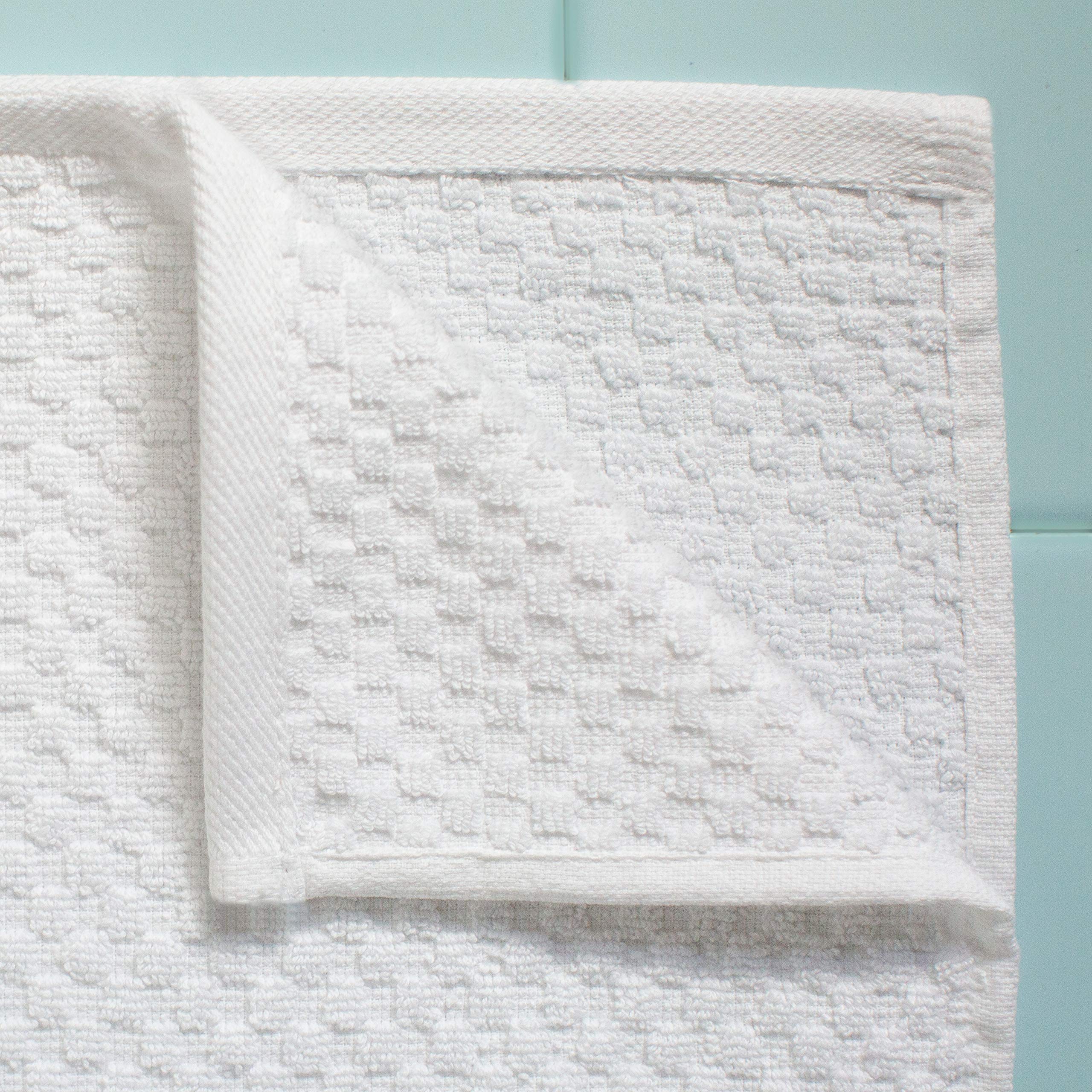 COTTON CRAFT folded stack on bathroom shelf demonstrating tidy storage and coordinated style