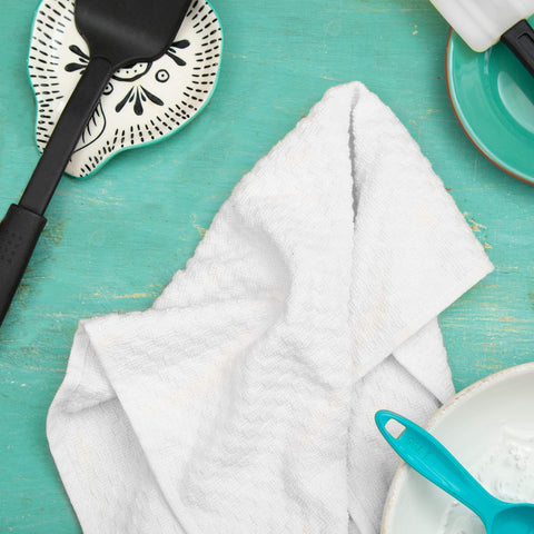 COTTON CRAFT towel covering bread on board showing clean serving benefit