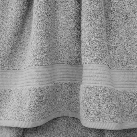Cotton Paradise bath towel hanging to show full size and quick-dry benefit