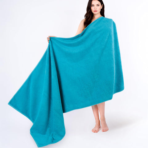 Cotton Paradise front folded towel showing Ocean Aqua color and neat presentation benefit: visual appeal