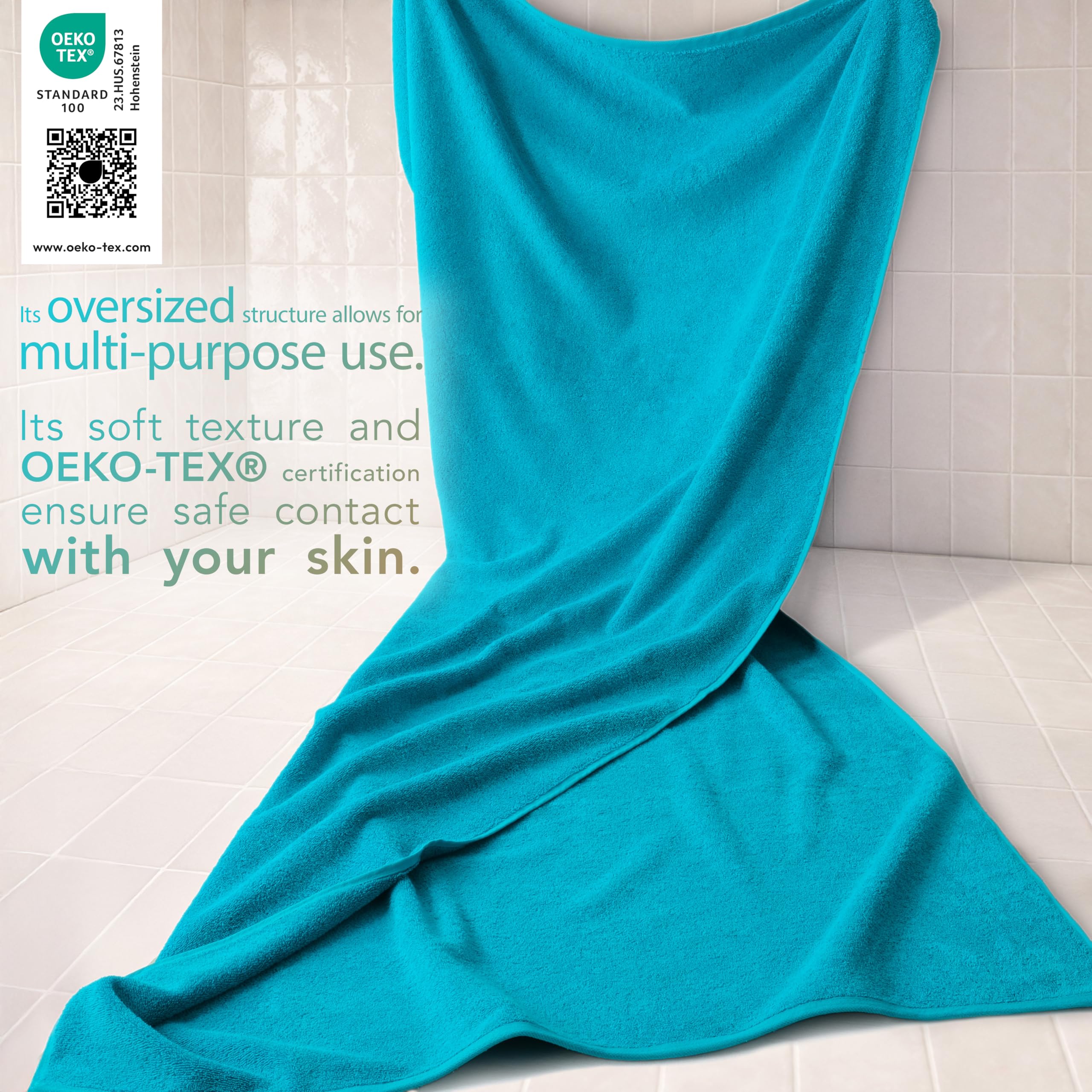 Cotton Paradise wrapped person using towel showing full coverage benefit: superior absorbency