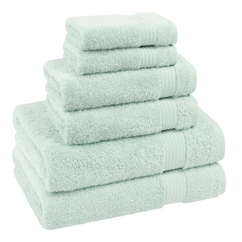 Cotton Paradise washcloth folded on shelf illustrating compact size and gentle touch