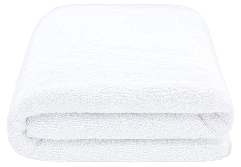 Cotton Paradise bath sheet next to standard towel showing oversized 40x80 scale advantage