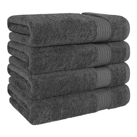 Cotton Paradise towel beside sink illustrating extra-large size and full coverage