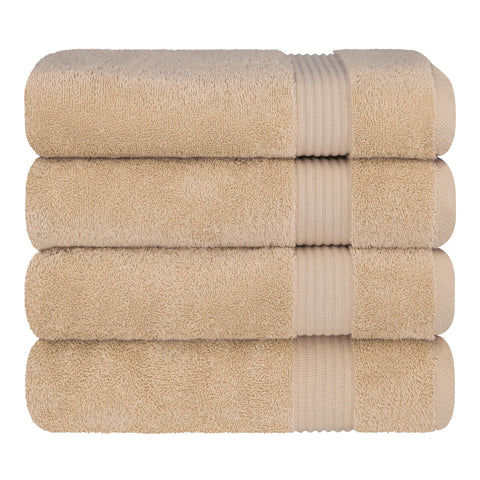 Cotton Paradise towel next to ruler showing 27x54 inches generous coverage