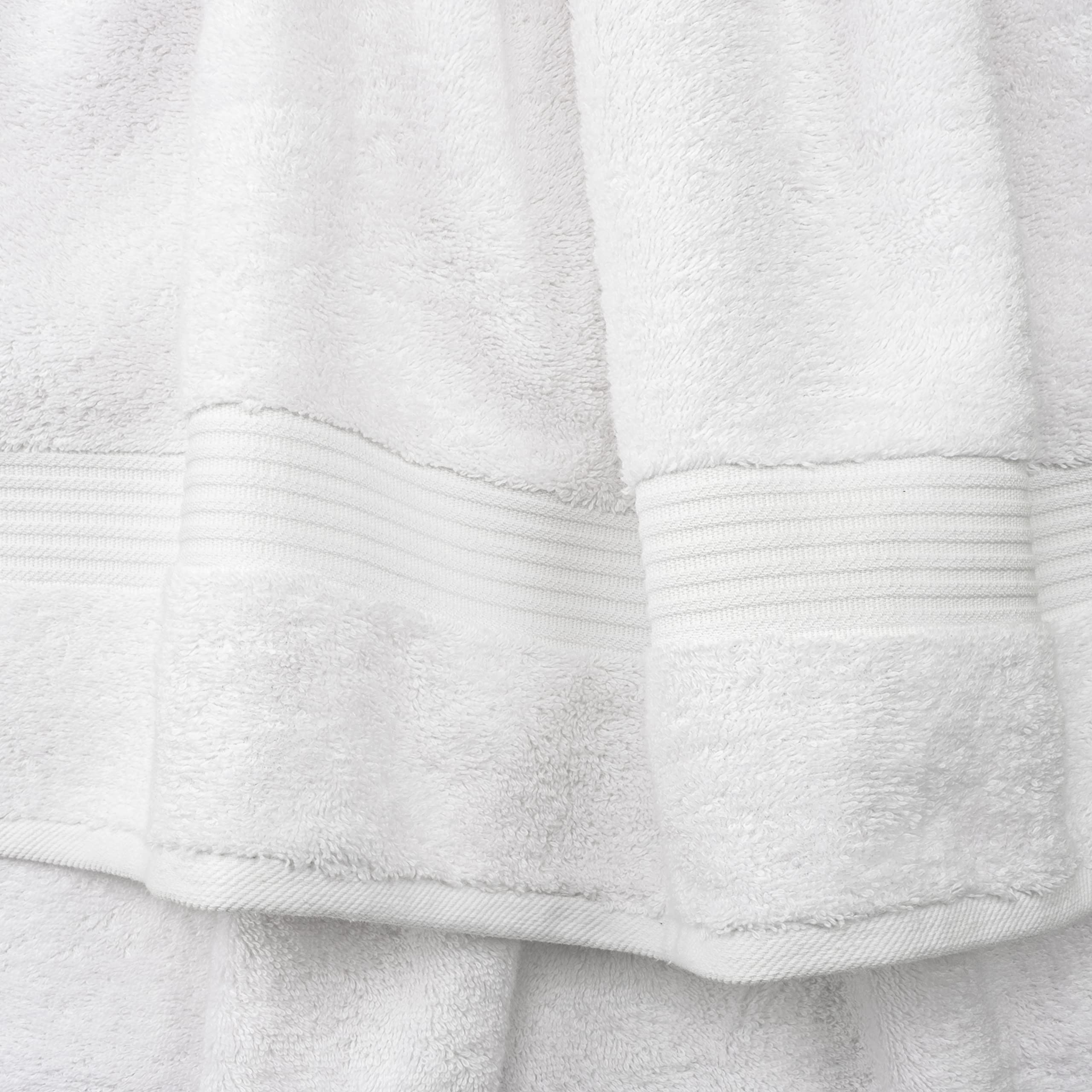 Cotton Paradise neatly stacked towels showing thickness and plush benefit