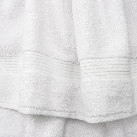 Cotton Paradise neatly stacked towels showing thickness and plush benefit