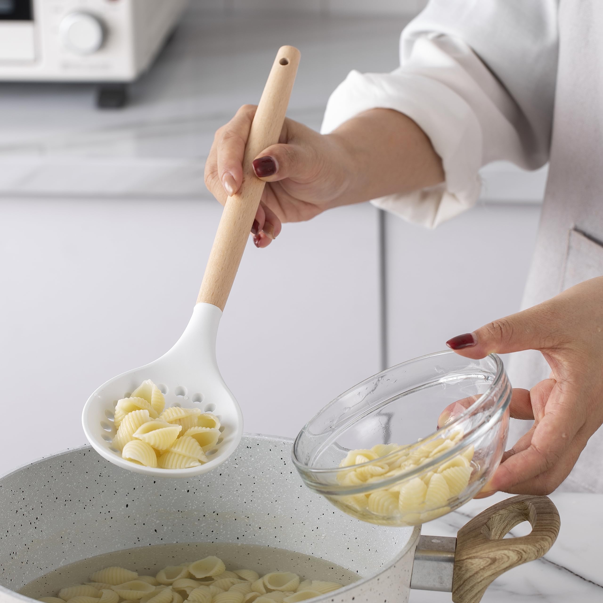 Country Kitchen serving salad with utensils in use demonstrating scratch-safe benefit