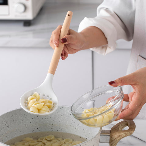 Country Kitchen serving salad with utensils in use demonstrating scratch-safe benefit