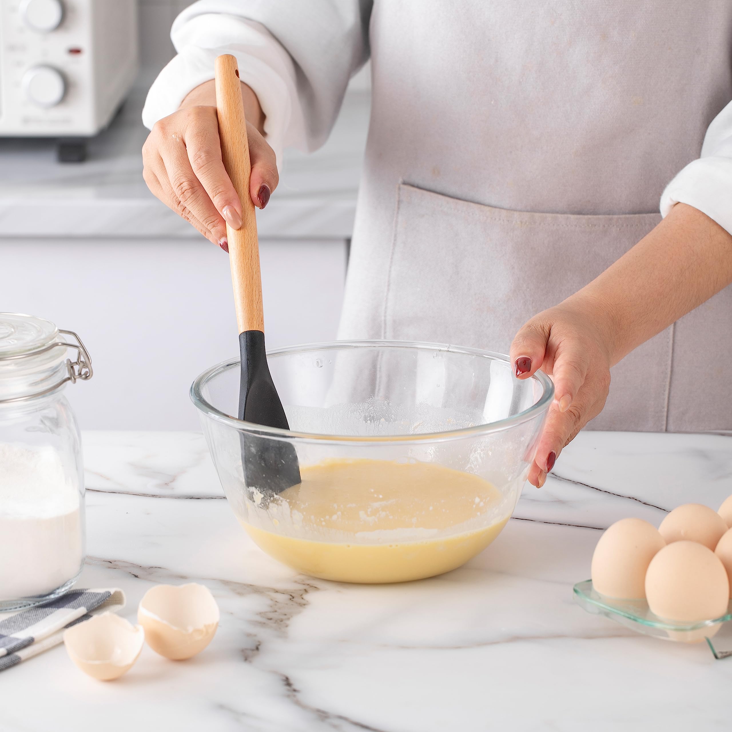 Country Kitchen utensils neatly stored in holder for easy countertop access