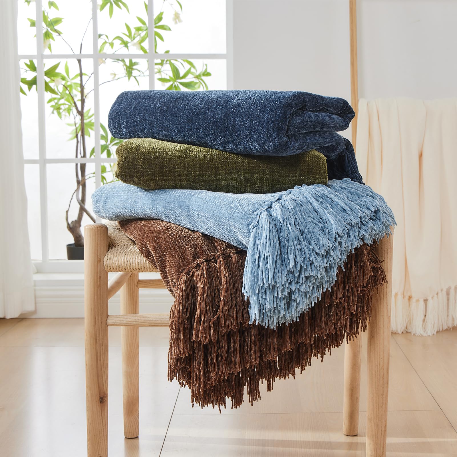CozeCube draped on bed demonstrating layering effect and room-enhancing color