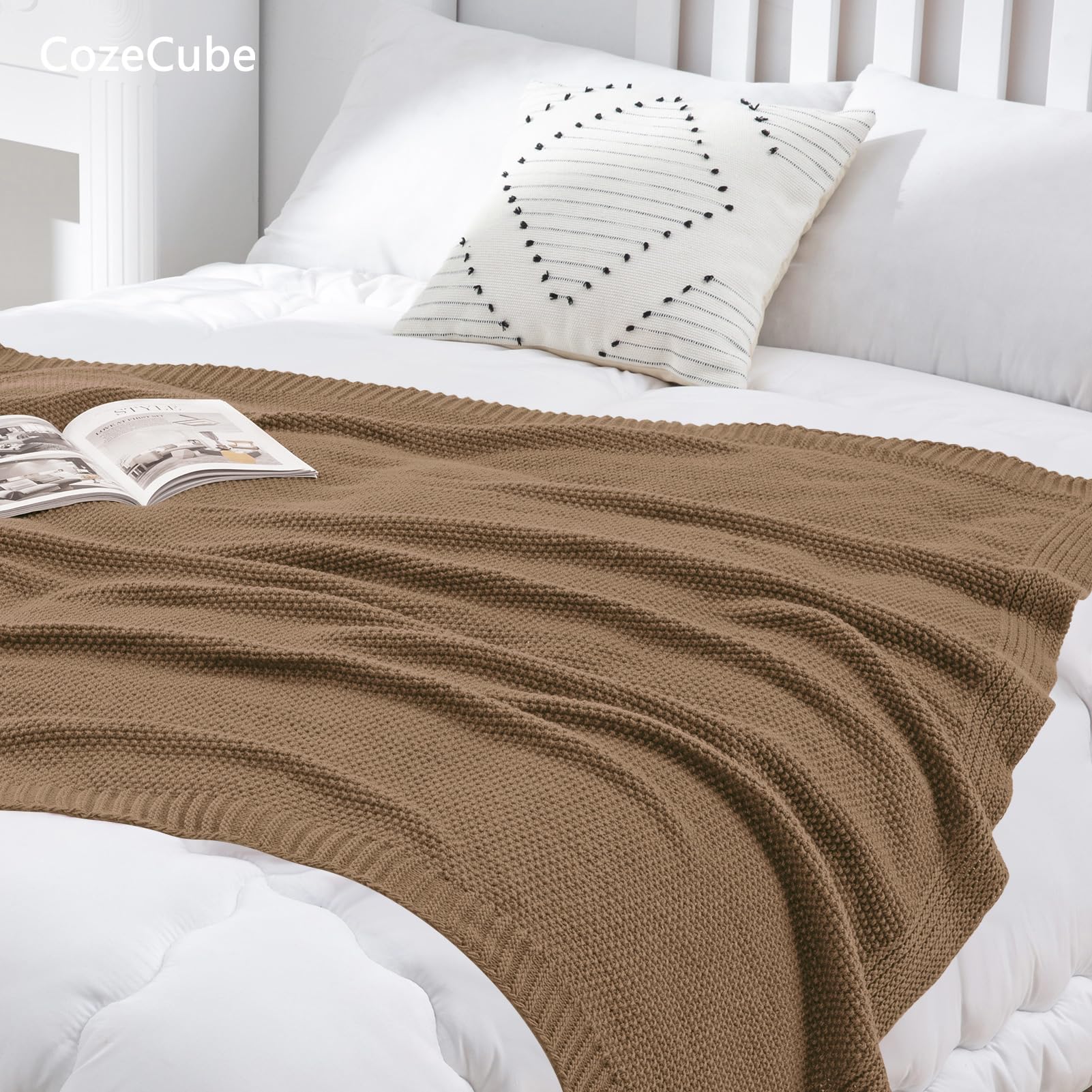 CozeCube folded at bed end providing a layered bedroom accent