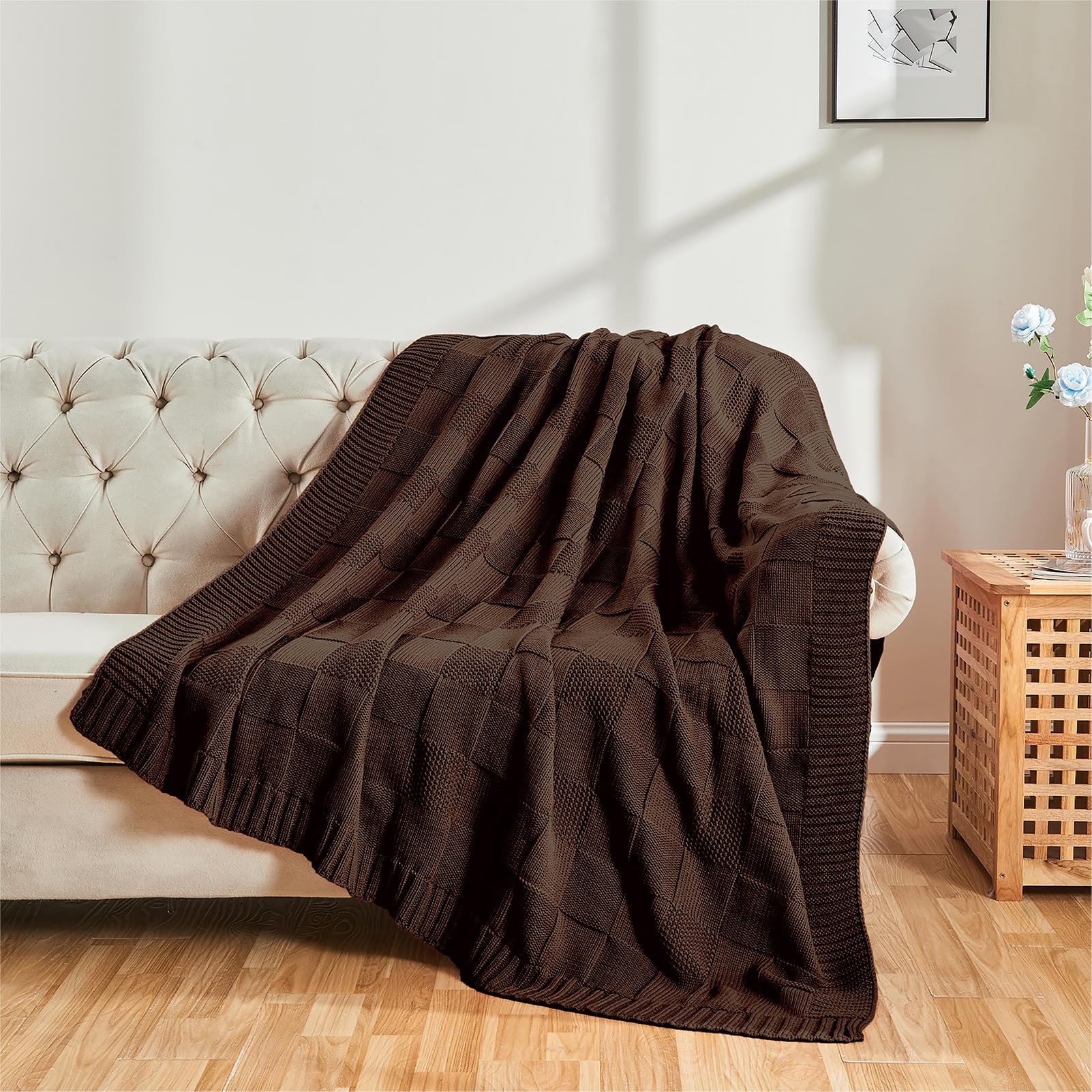 CozeCube folded on bed end adding warm, textured layer to bedding