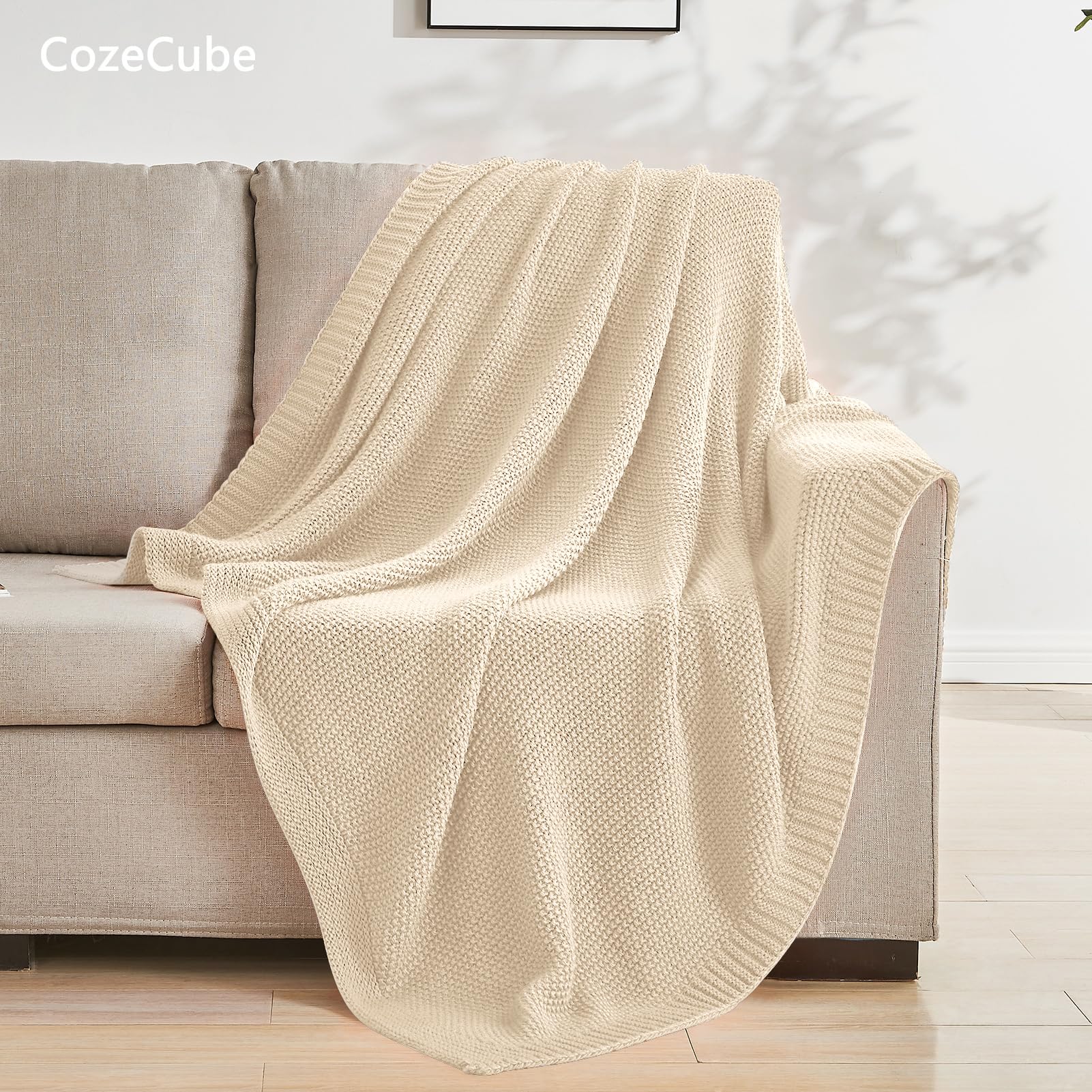 CozeCube throw draped on sofa adding farmhouse texture and comfort
