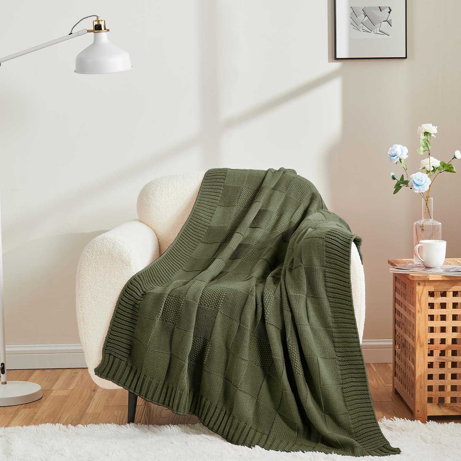 CozeCube throw draped across sofa adding color and comfortable seating appeal