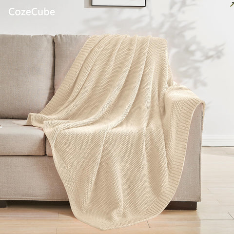 CozeCube throw draped on sofa adding farmhouse texture and comfort