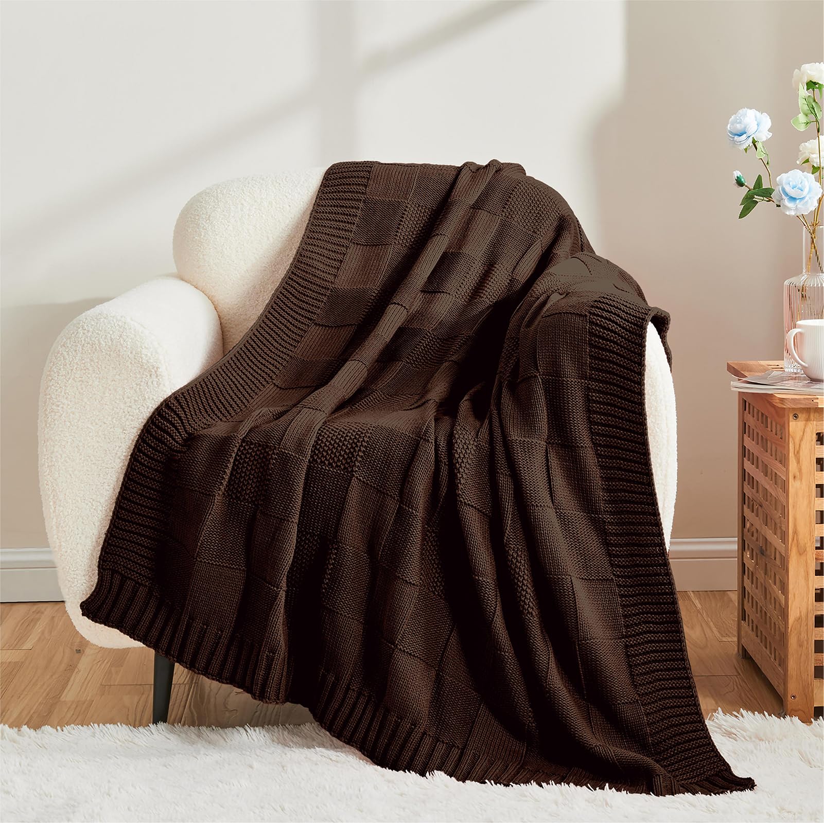 CozeCube draped over sofa demonstrating cozy, stylish living room accent