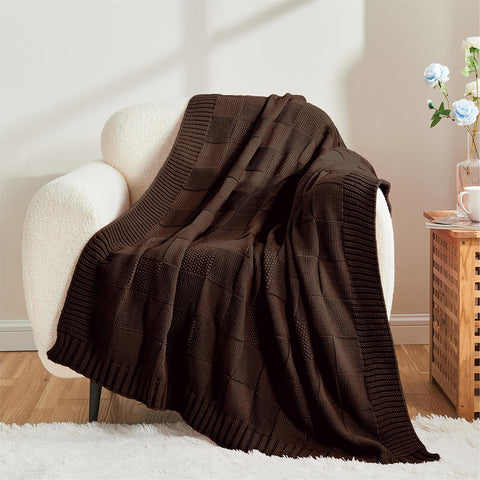 CozeCube draped over sofa demonstrating cozy, stylish living room accent