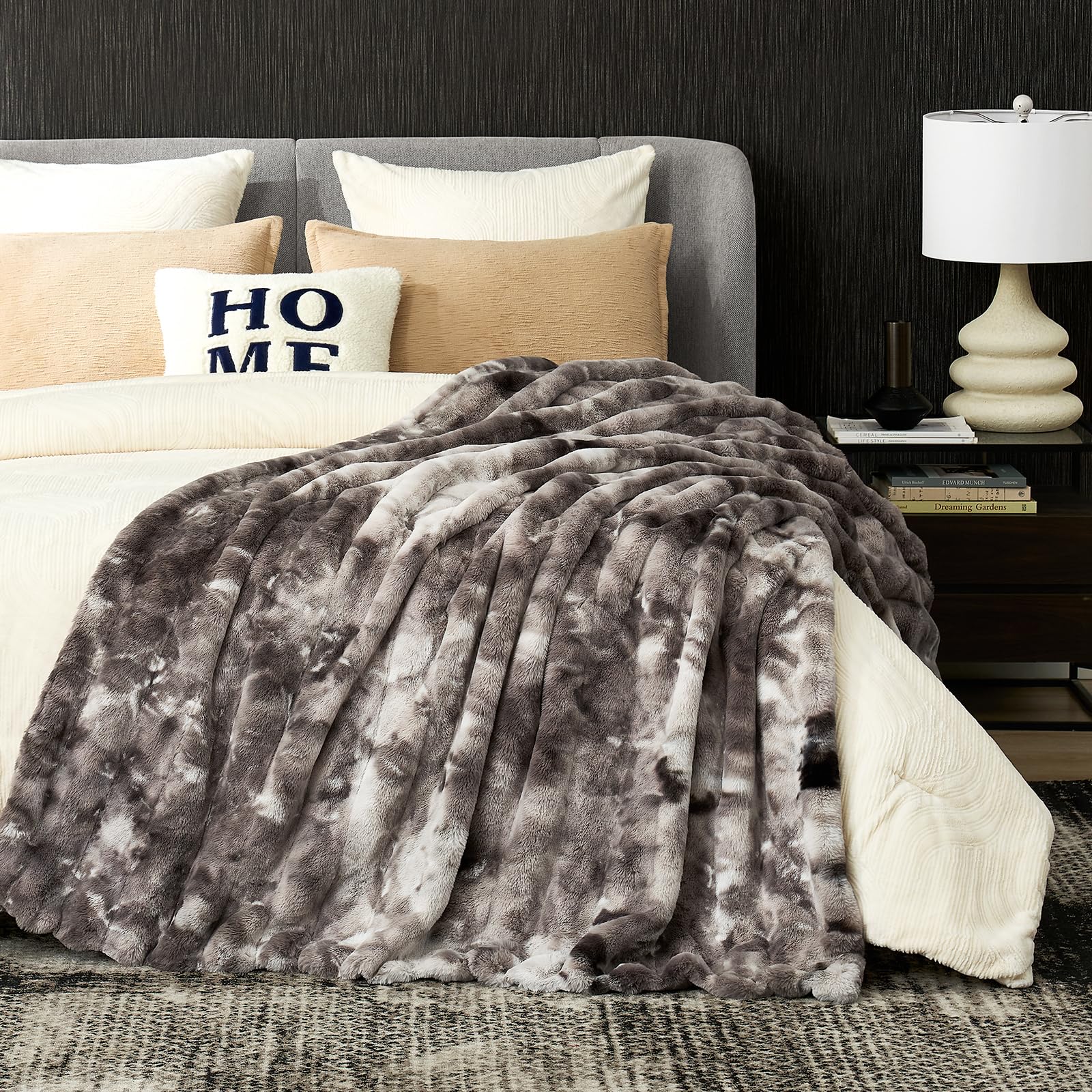 Cozy Bliss draped at foot of bed, creates layered bedroom coziness